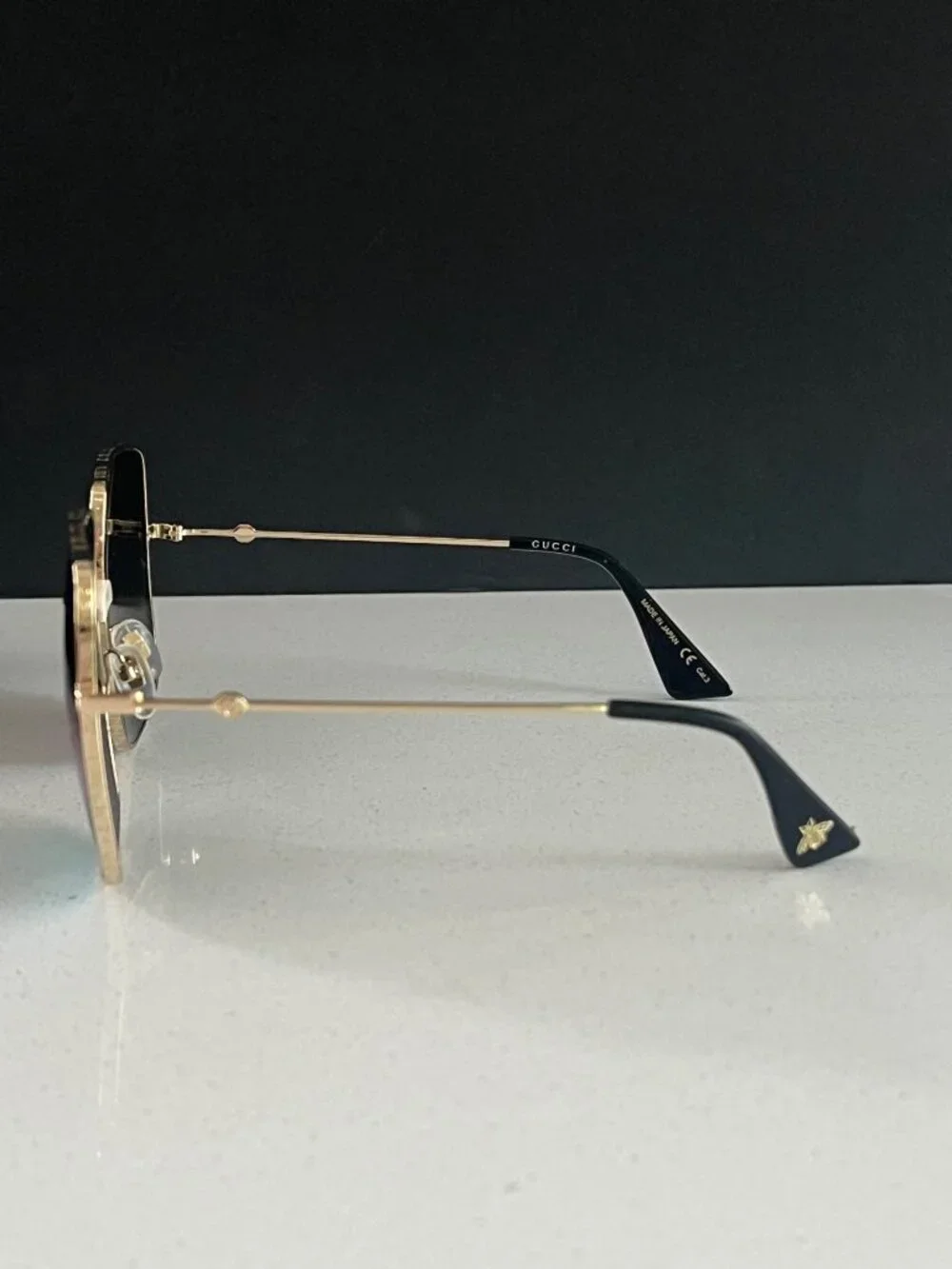 Gucci GG0414S square tiger sunglasses